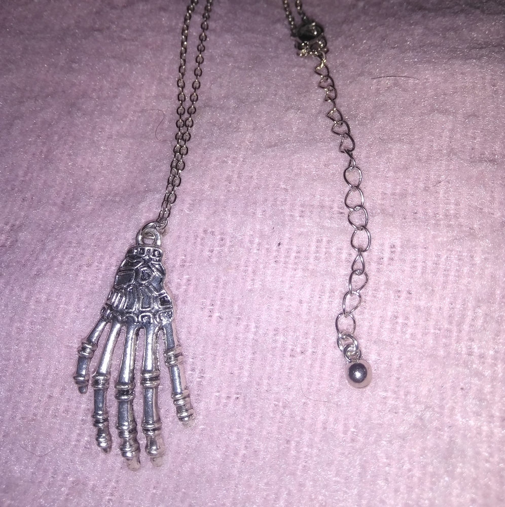 Skeleton hand necklace